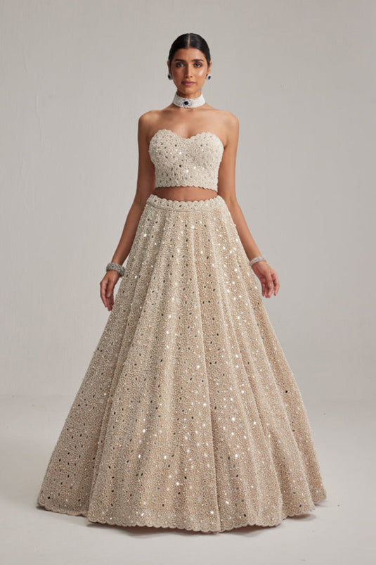 Light Beige Dense mirror and pearl Corset lehenga set