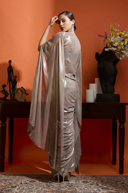 Cape Style Ensemble Paired with a Drape Skirt