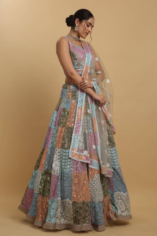 Divyam Multi Colored Thread And Mirror Embroidered Lehenga Set