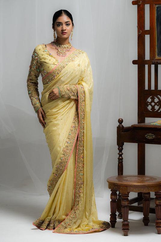 Charming Cream Embroidered Saree