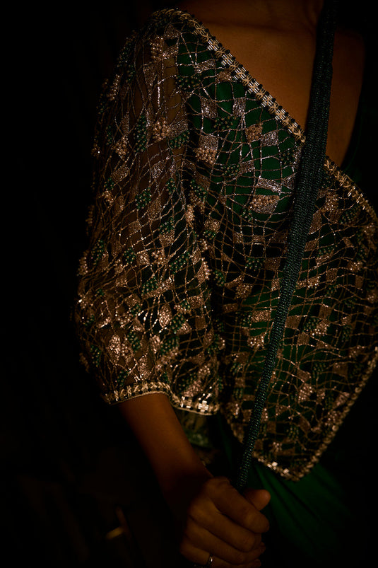 Emerald Green Draped Saree Paired with Embroidered Tulle Cape