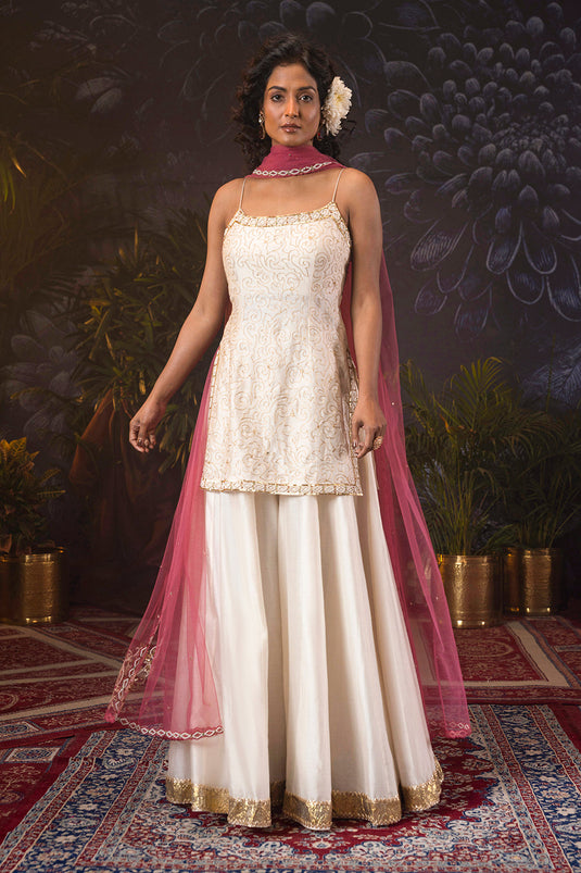 Ivory Silk Chanderi Spaghetti Kurti,Sharara Set Paired With Onion Pink Dupatta