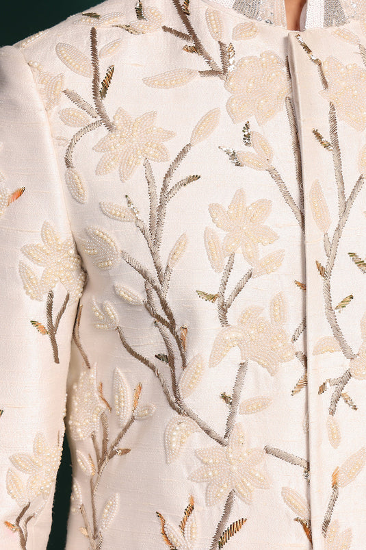 Ivory white raw silk sherwani with heavy embellished work