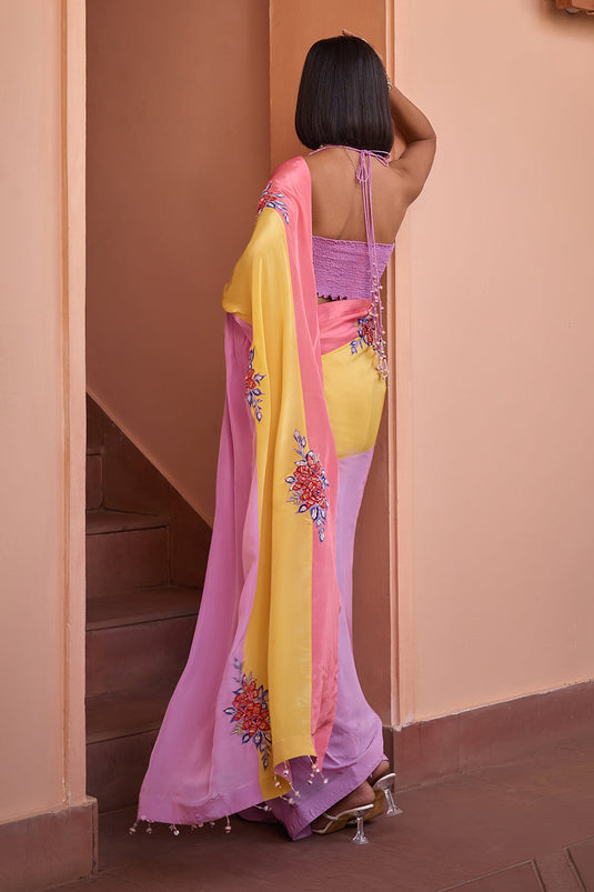 Multi color embroidered saree with halter blouse