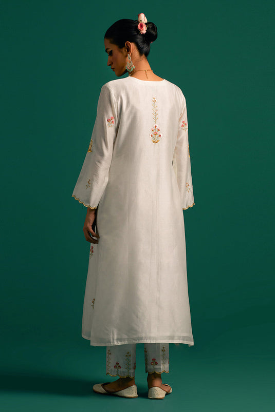 Off White V neck hand embroidered silk chanderi kurta set with green chanderi dupatta