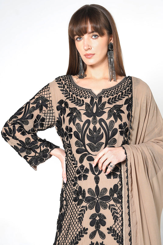 Peach Georgette Kurta Set Featuring Intricate Black Embroidery And Sheer Dupatta