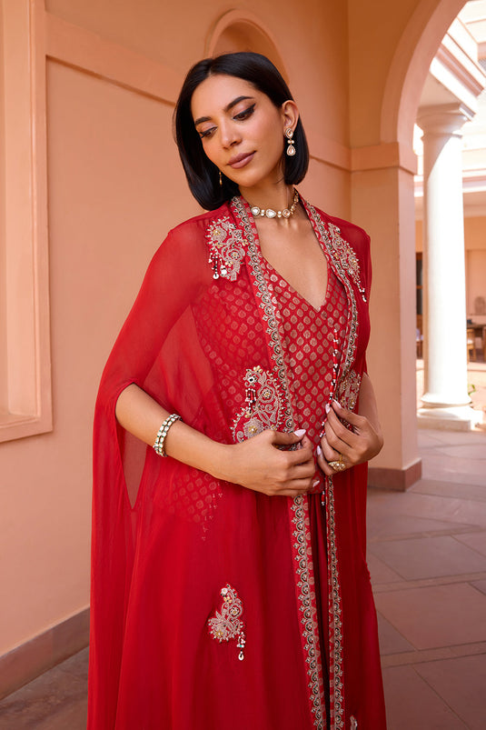 Red embroidered cape with waistcoat and skirt