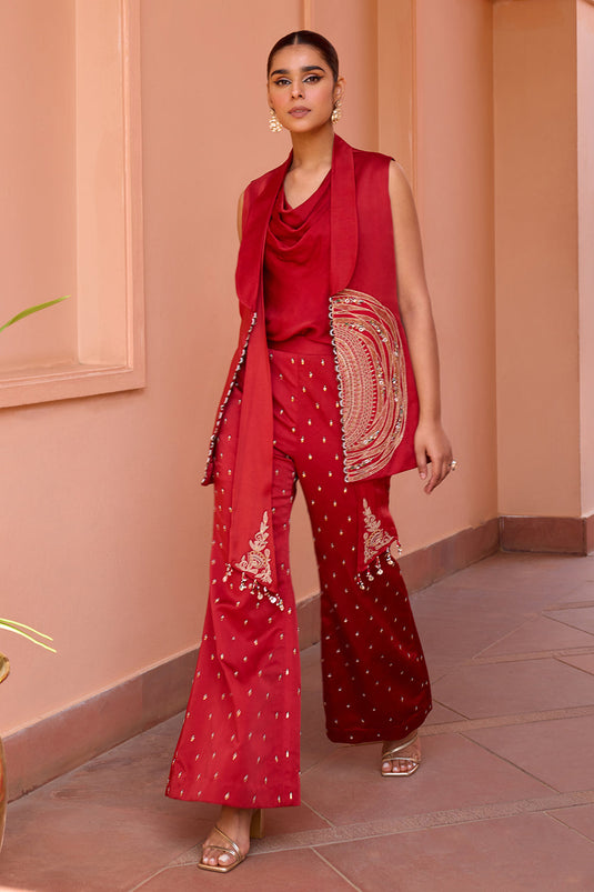 Red embroidered jacket with drape top and pants