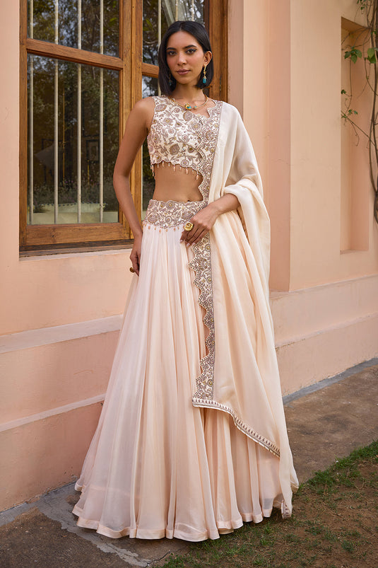 White embroidered one shoulder lehenga set