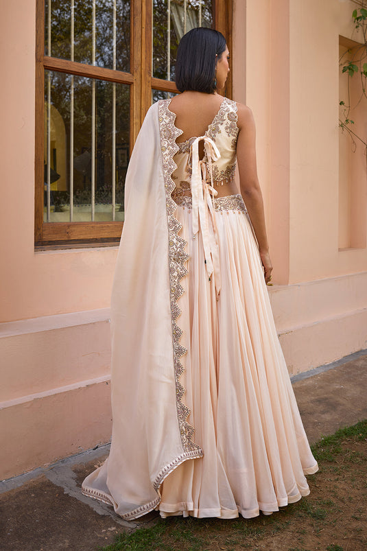 White embroidered one shoulder lehenga set