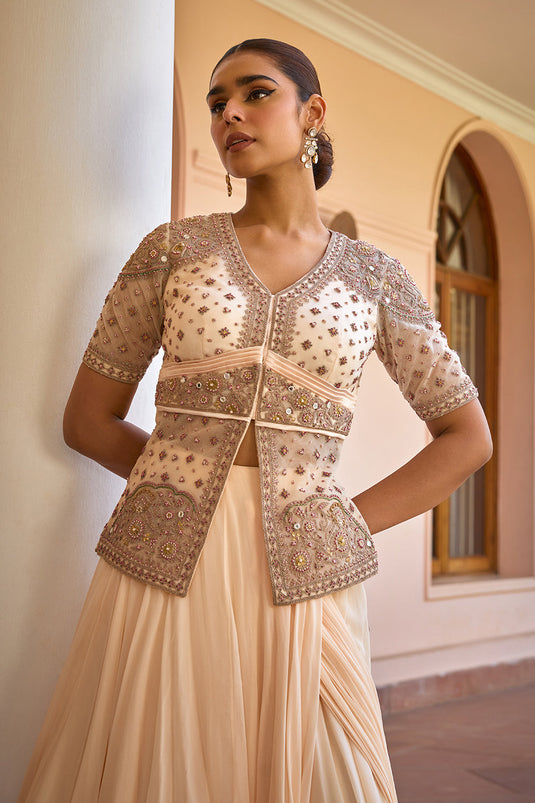 White pre draped lehenga saree with embroidered jacket