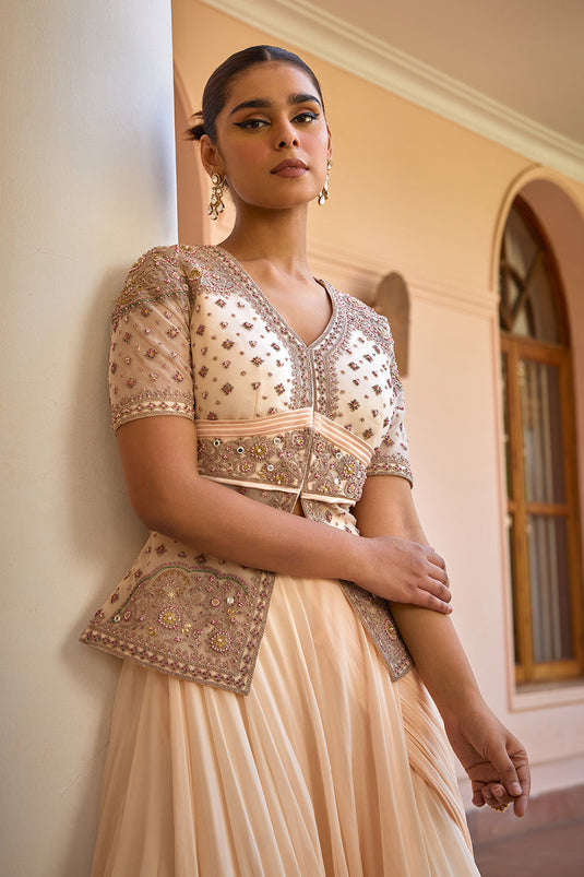 White pre draped lehenga saree with embroidered jacket