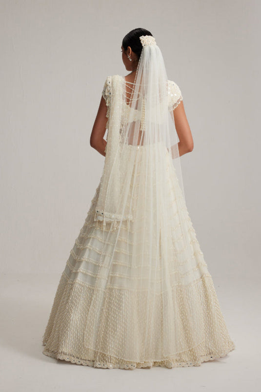 Off White Mirror and Pearl Drop Bridal lehenga set with Veil
