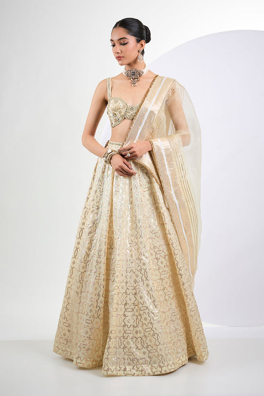 Ivory Banarasi lehenga with hand embroidered blouse and Dupatta