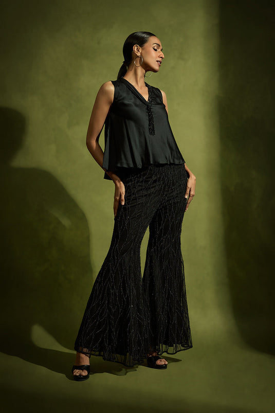 Noir Short Top Paired with Pearl Embellished Pants