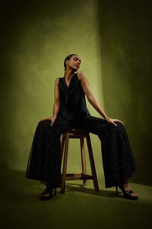 Noir Short Top Paired with Pearl Embellished Pants