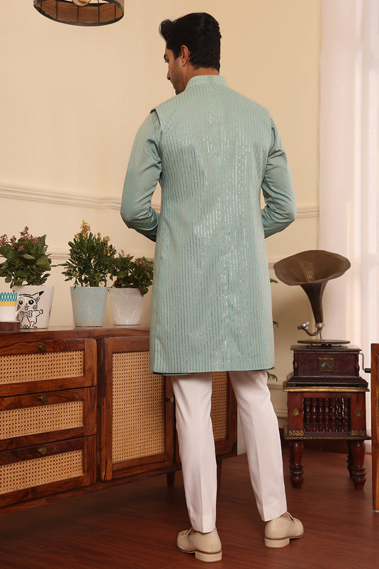 Aqua green colour kurta pants with shrug jacket