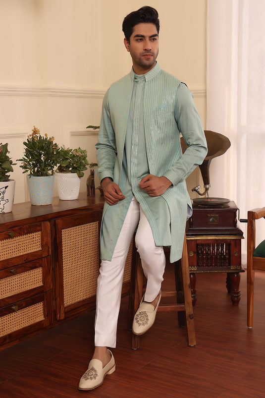 Aqua green colour kurta pants with shrug jacket
