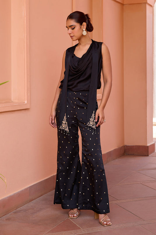 Black cowl drape top with embroidered pants