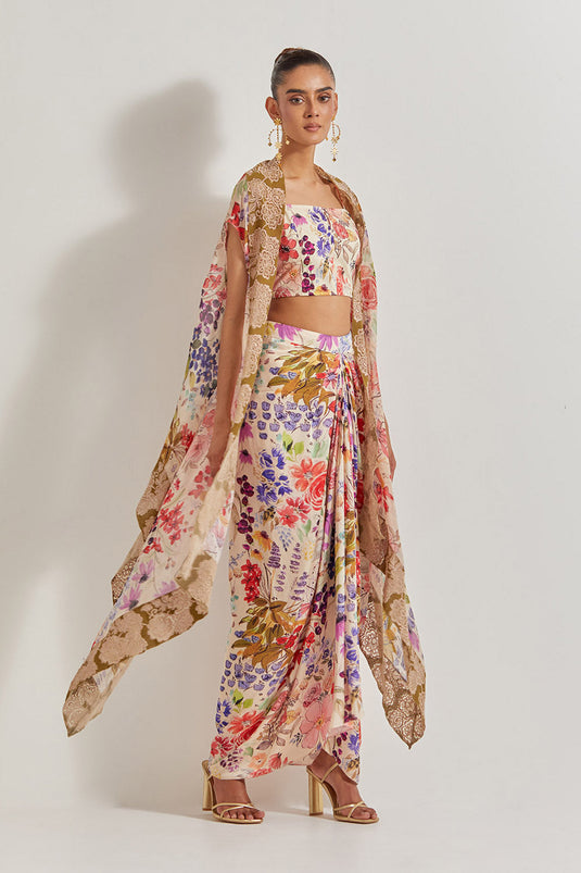 Blooming Burst  Satin Cowl Skirt Paired With Stretch Bustier And Georgette Cape With Lace Border