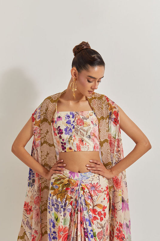 Blooming Burst  Satin Cowl Skirt Paired With Stretch Bustier And Georgette Cape With Lace Border