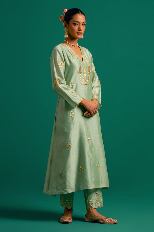 Green V neck hand embroidered silk chanderi kurta set