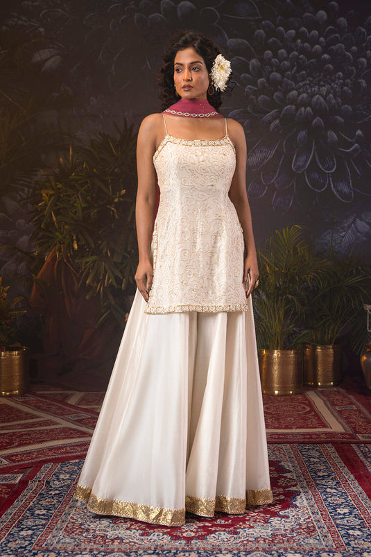 Ivory Silk Chanderi Spaghetti Kurti,Sharara Set Paired With Onion Pink Dupatta