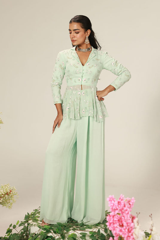 Mint Green Peplum-Style Top Paired With Flowy Wide-Leg Pants