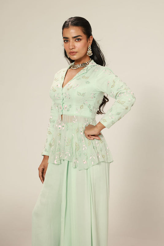 Mint Green Peplum-Style Top Paired With Flowy Wide-Leg Pants
