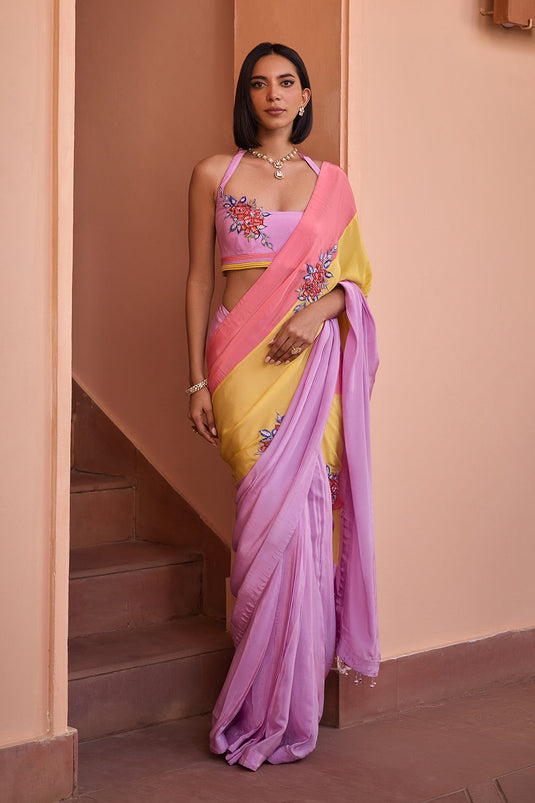 Multi color embroidered saree with halter blouse