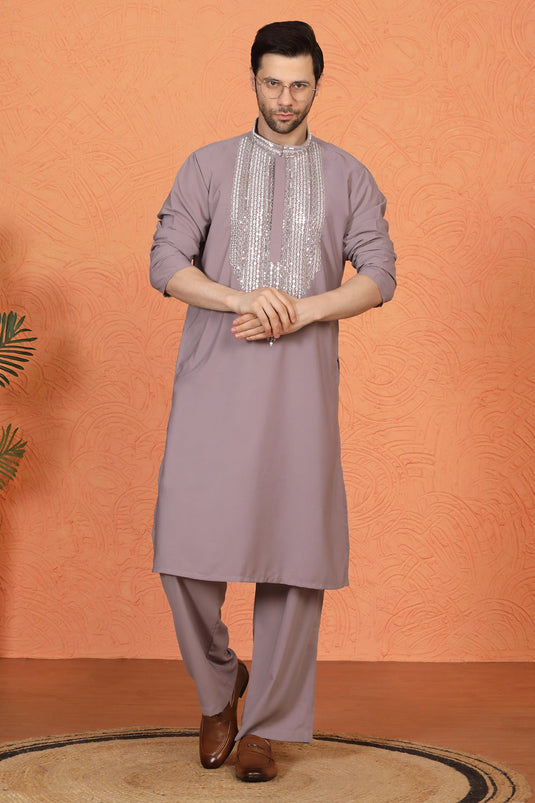 Nawaaz  Embroidered Kurta with Loose Fit Parallel Matching  Pants