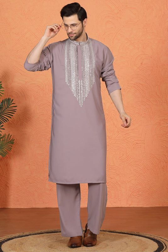 Nawaaz  Embroidered Kurta with Loose Fit Parallel Matching  Pants