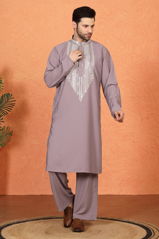 Nawaaz  Embroidered Kurta with Loose Fit Parallel Matching  Pants