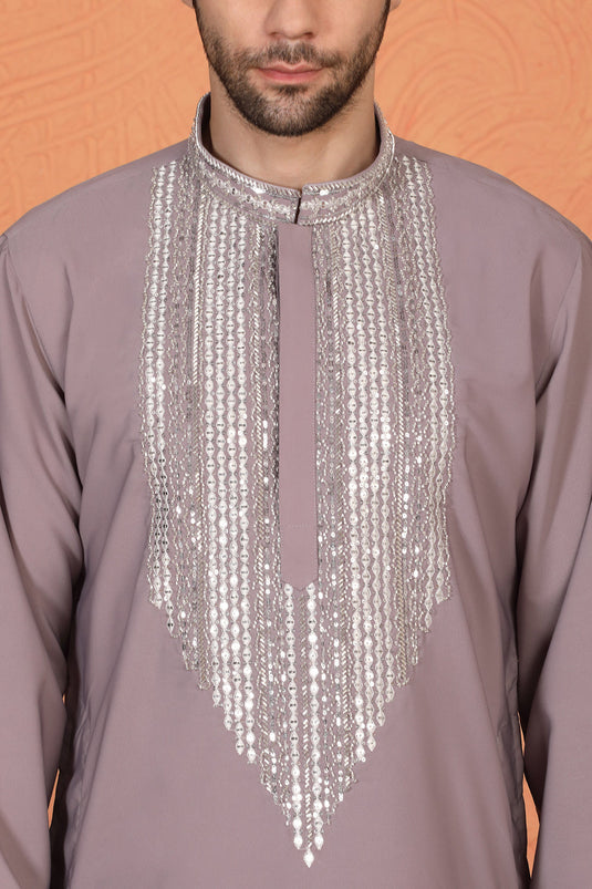 Nawaaz  Embroidered Kurta with Loose Fit Parallel Matching  Pants