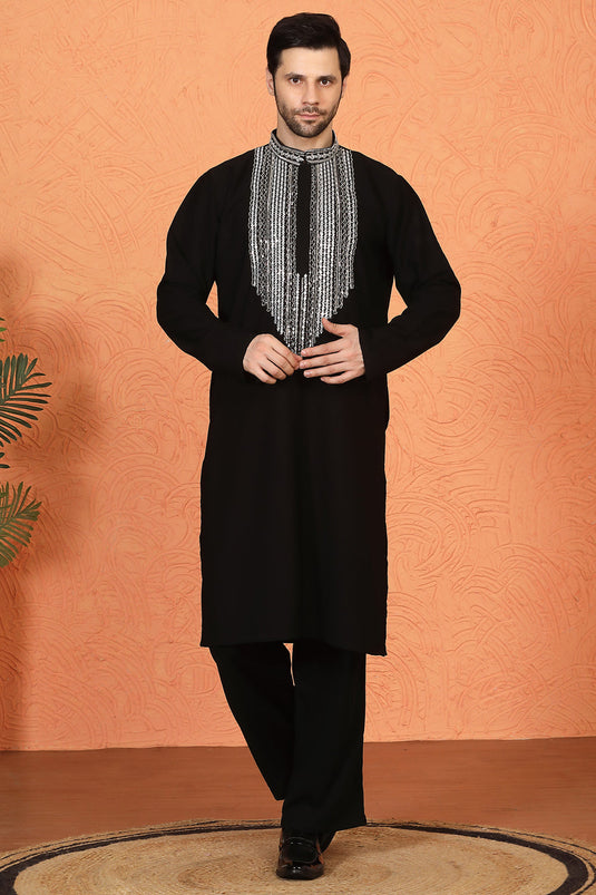 Nawaaz  Embroidered Kurta with Loose Fit Parallel Matching  Pants
