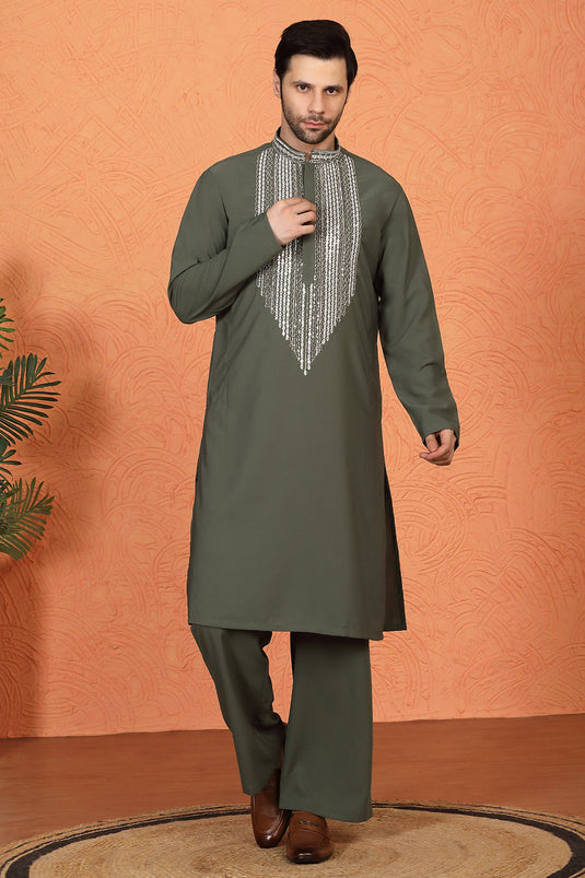 Nawaaz  Embroidered Kurta with Loose Fit Parallel Matching  Pants