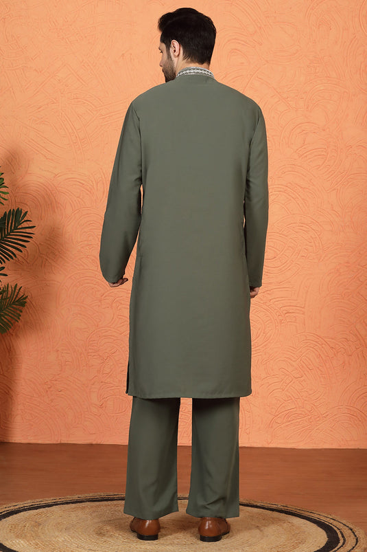 Nawaaz  Embroidered Kurta with Loose Fit Parallel Matching  Pants