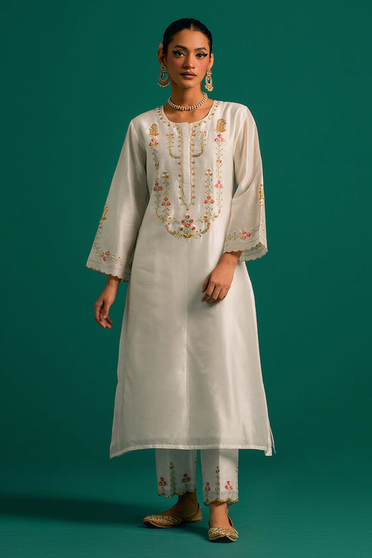 Off White hand embroidered silk chanderi kurta set with dark pink dupatta