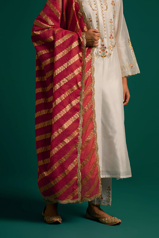 Off White hand embroidered silk chanderi kurta set with dark pink dupatta