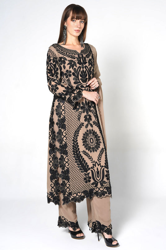 Peach Georgette Kurta Set Featuring Intricate Black Embroidery And Sheer Dupatta