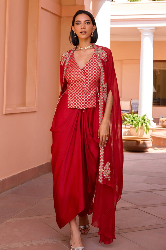 Red embroidered cape with waistcoat and skirt