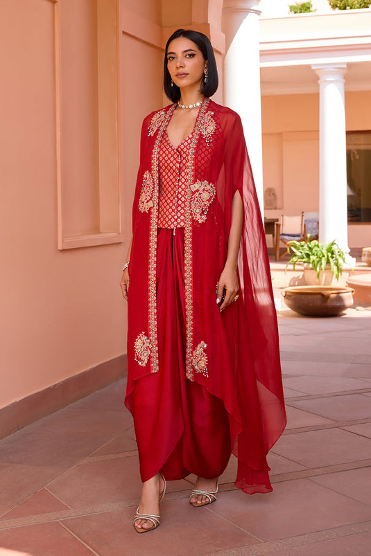 Red embroidered cape with waistcoat and skirt