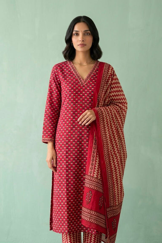 Red kurta paired with zig zag printed pants and dupatta