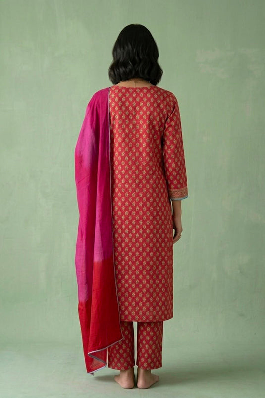 Red kurta set paired with shaded dupatta