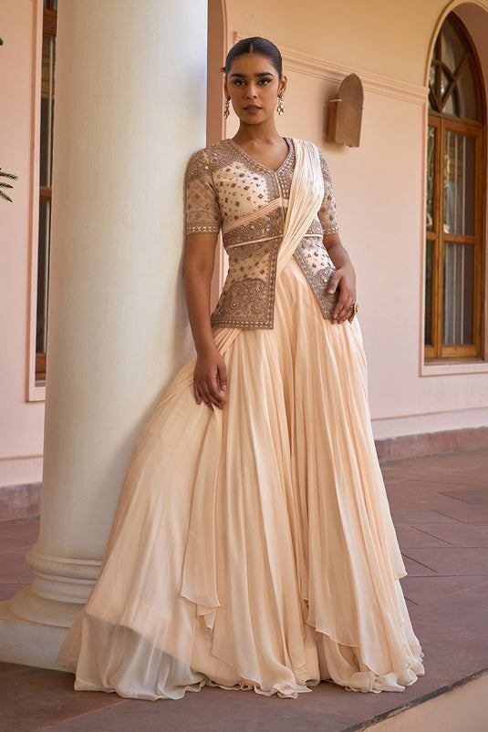 White pre draped lehenga saree with embroidered jacket