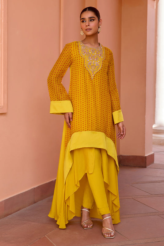 Yellow bandhani layered and embroidered kurta set with dupatta