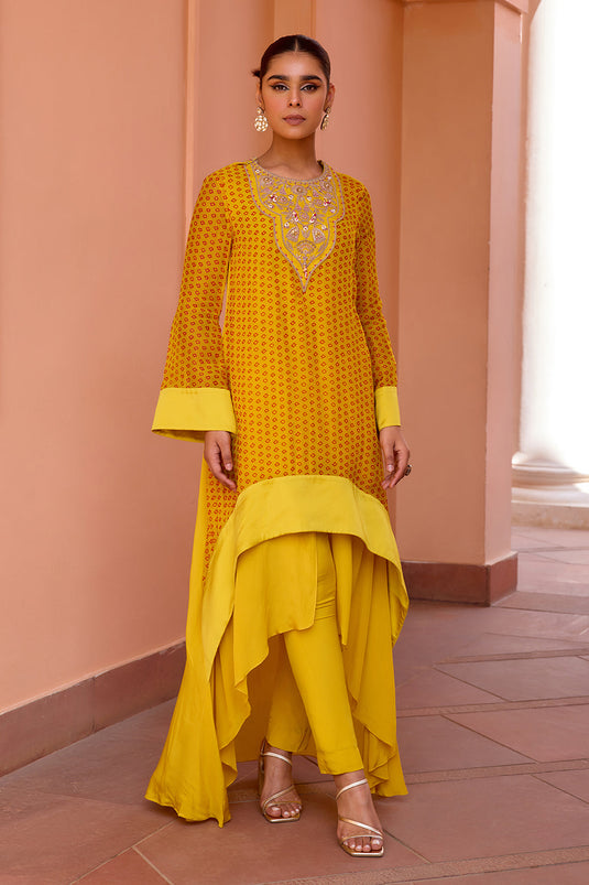Yellow bandhani layered and embroidered kurta set with dupatta