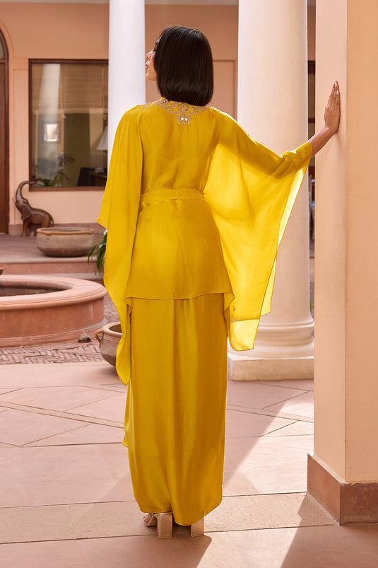 Yellow embroidered kaftan top with belt and bustier